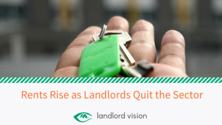 Hand holding out keys