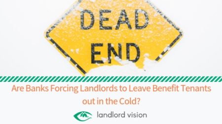 A dead end sign with snow