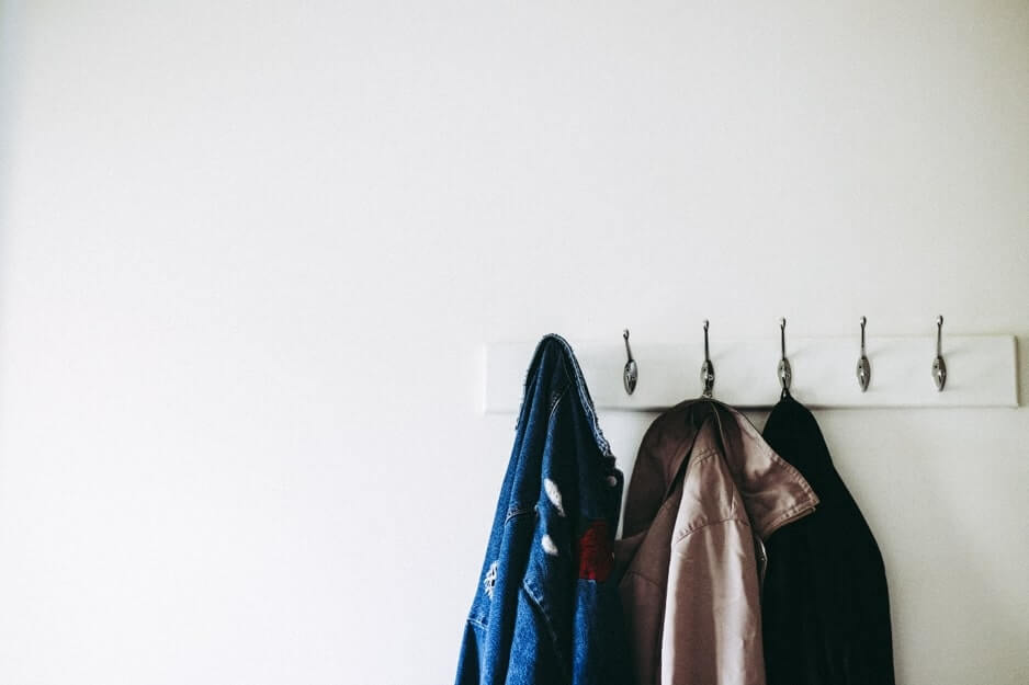 A decluttered coat hanger in a hallway