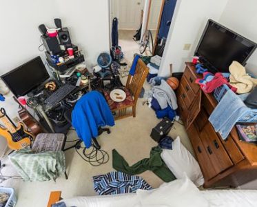 messy room covered in tenant belongings