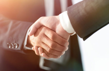 Business handshake and business people. Business concept.