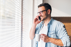 a man on the phone with a friend