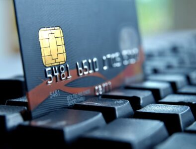 23130965 - credit card on a computer keypad