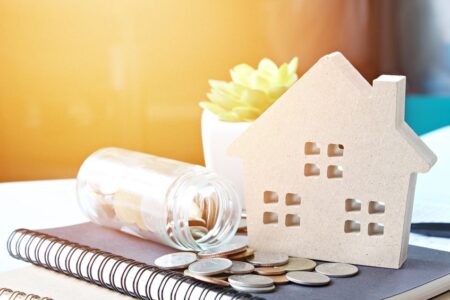 a small house on top of a notebook