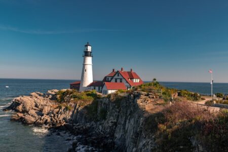lighthouse and house on island
